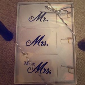 Mr. Mrs. More Mrs. luggage tags.